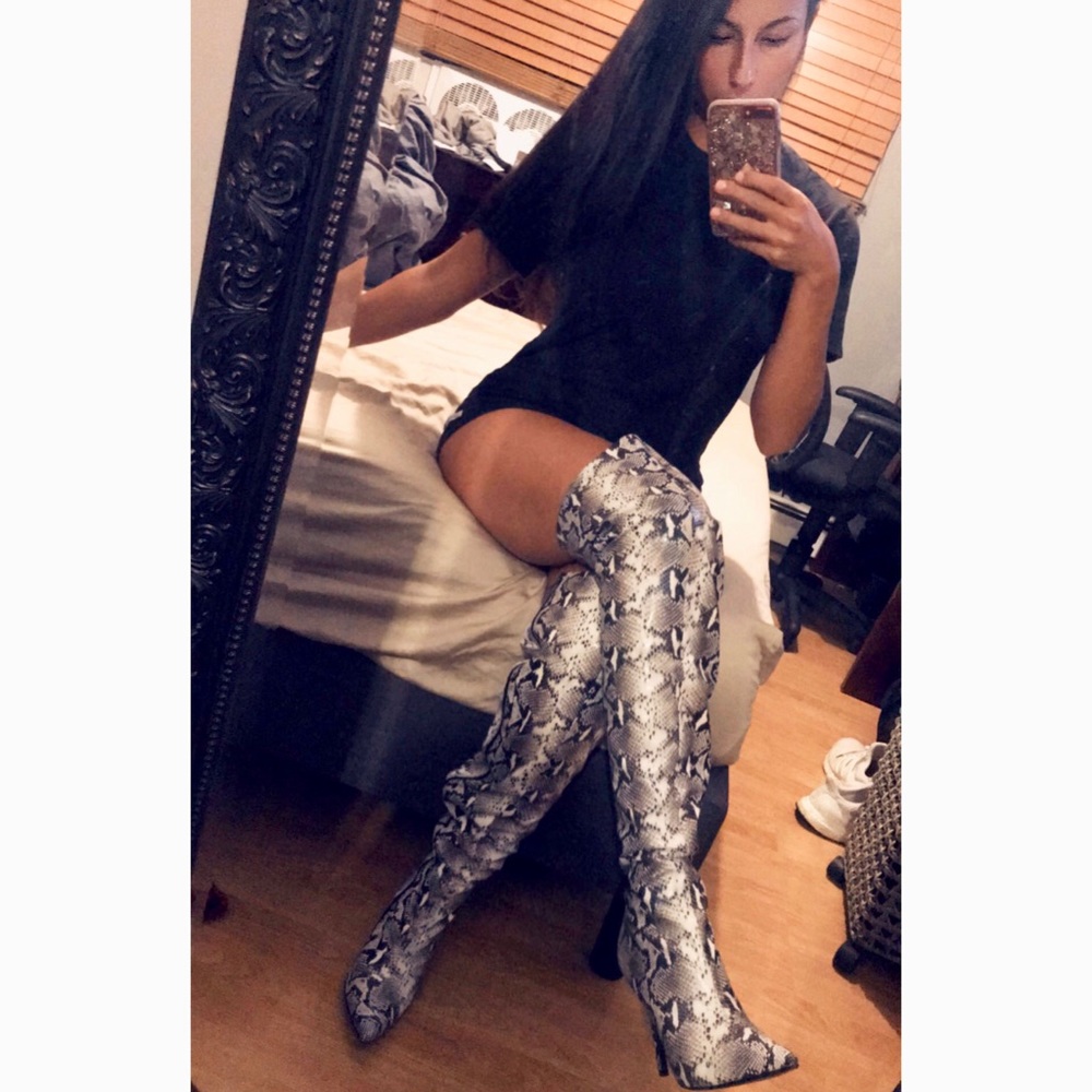 Snakeskin thigh High boots